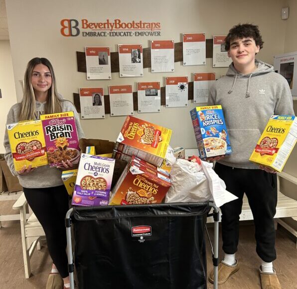 Kids Donating Food from a Neighborhood Food Drive