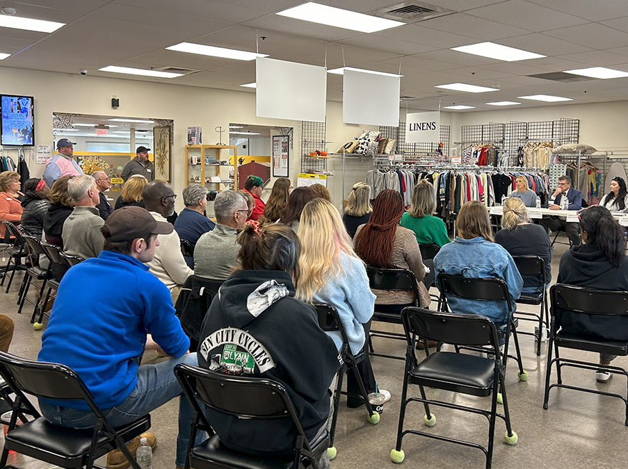 image of staff listening to guest speakers