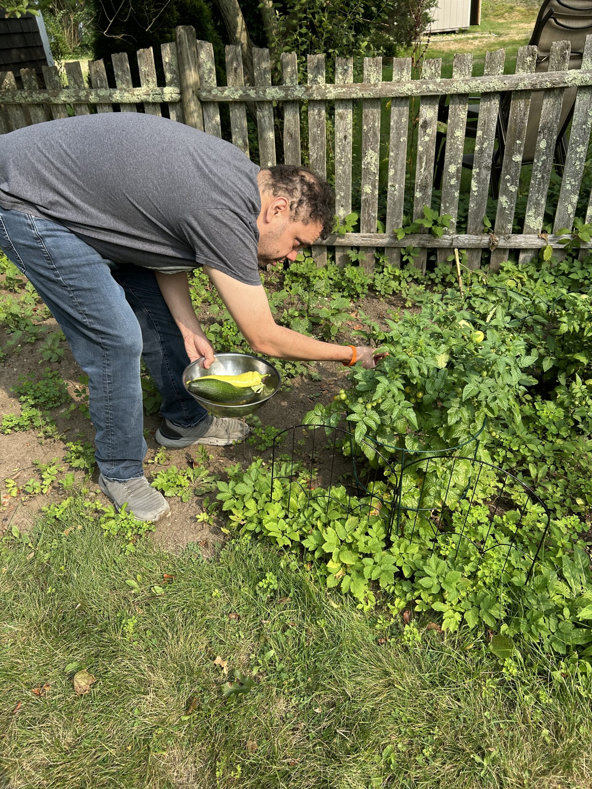 Amaury tending to his garden